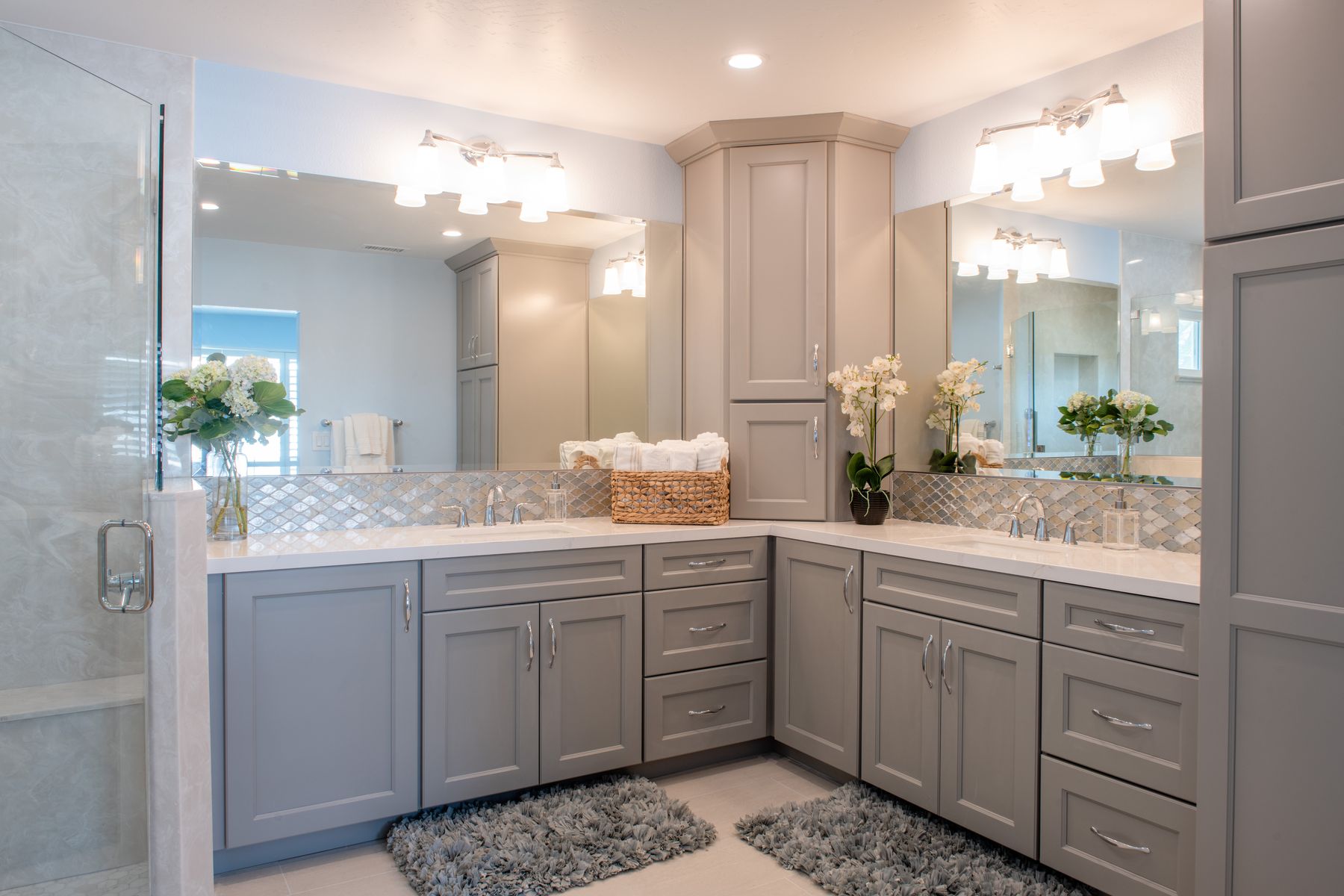 Primary bathroom remodel in San Diego with a double vanity and a walk-in shower