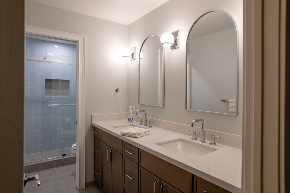 Del Mar, three bathrooms, one palette, a Kaminskiy bathroom remodel in San Diego County
