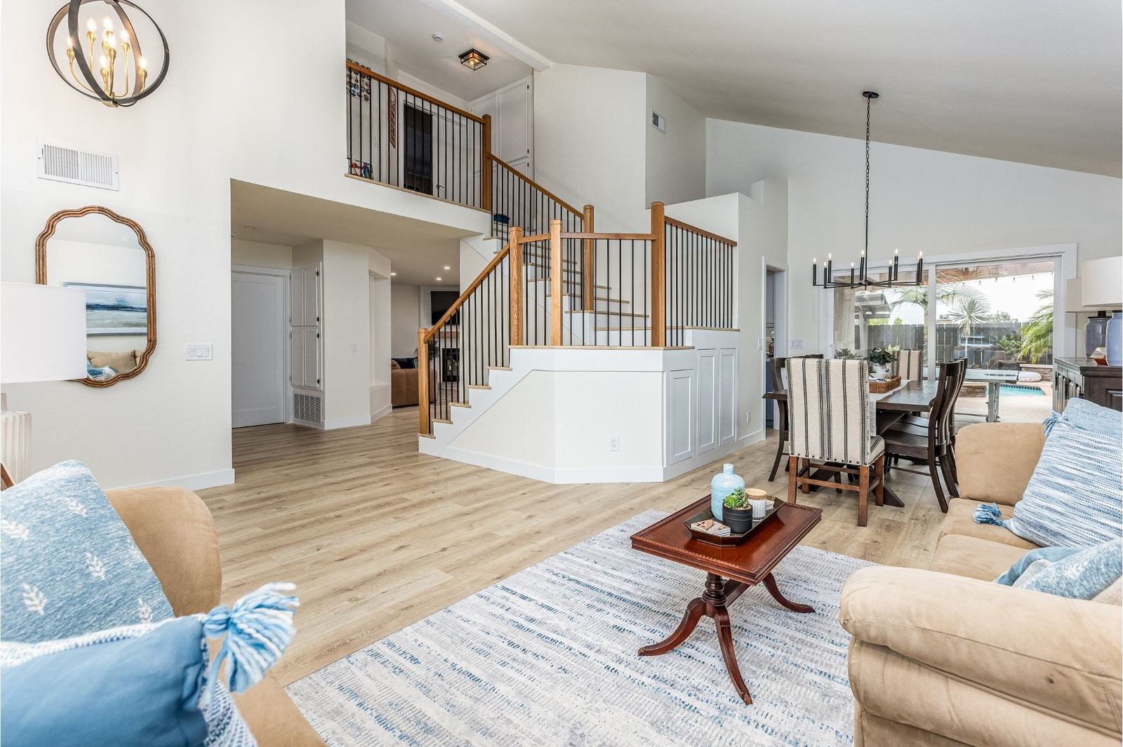 Open staircase, LVP floors, vaulted great room