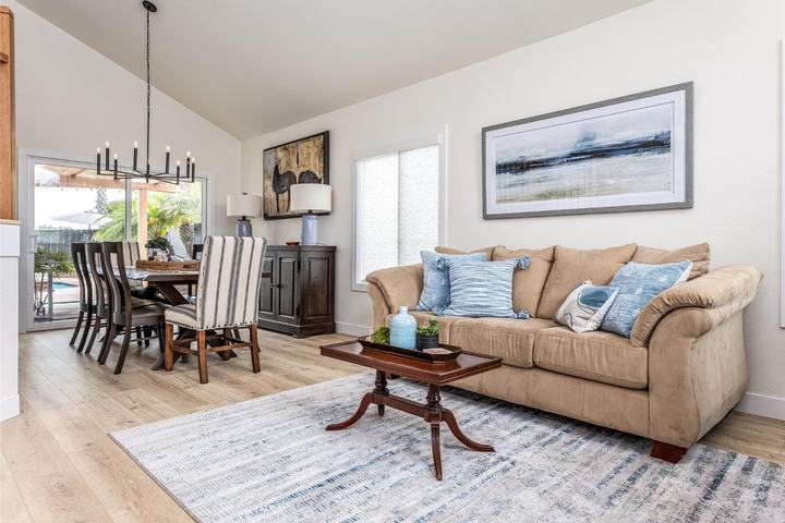 Open living-dining space with pool view
