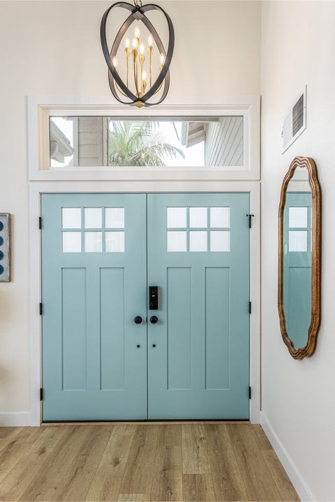 Surf-blue double entry doors and pendant light