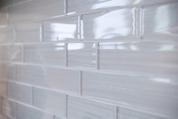 Close-up of Elysium Casale mosaic backsplash tile with glossy texture