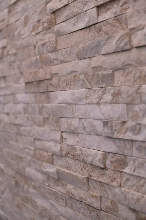 Stacked Stone on Staircase Wall
