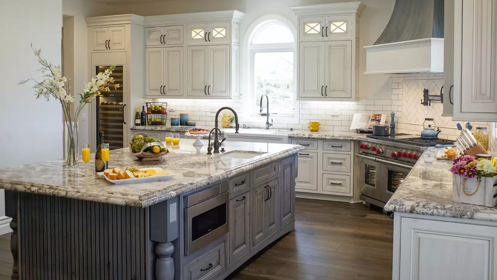 White classic kitchen remodel in San Diego with Shaker cabinets and marble-look counters